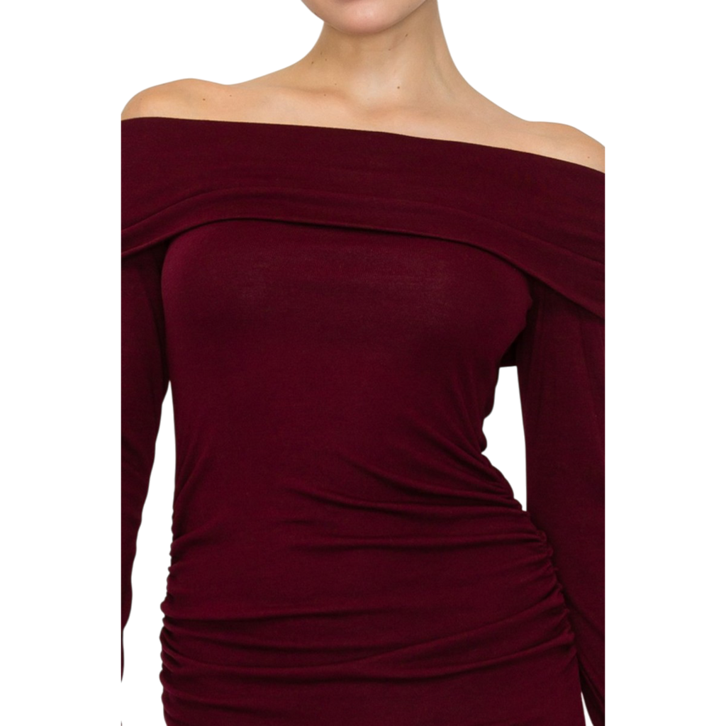 Close-up of off-shoulder ruched midi dress